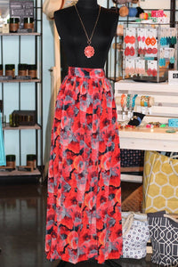 Cherry skirt with elegant gold and black sequin detailing on satin fabric