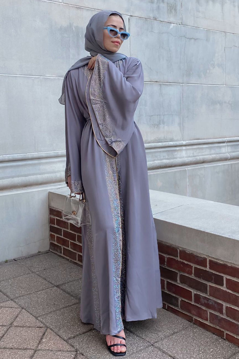 silver abaya dress Silver abaya Shimmer silver abaya with baloon sleeves and belt detailing Abayas from Cucire at Boksha